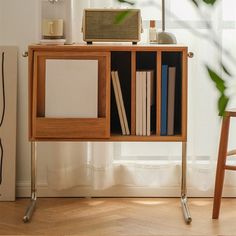 a book shelf with books and other items on it