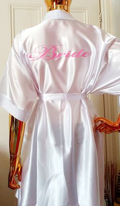 a robe with the word bride written on it