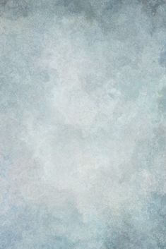 an abstract background with white and blue colors in the middle, including some small clouds