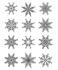 snowflakes drawn in black ink on white paper