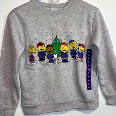 Brand: Peanuts Light Up Christmas Sweater On/Off Switch Is In A Small Pocked Inside Sweater Brand New (Has Size Sticker With No Tag) I Had Multiple Of These In Different Sizes But Only Have Size 7 Left. 61% Cotton 39% Polyesters Peanuts Shirts, Light Up Christmas Sweater, Christmas Merry And Bright, Kids Light, Black Crewneck Sweatshirt, Brown Christmas, Peanuts Christmas, Charlie Brown Christmas, Christmas Hoodies