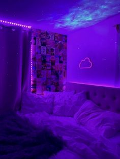 a bedroom with purple lighting and pictures on the wall above the bed, along with curtains