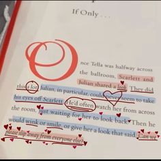 an open book with some type of writing on it's page and hearts drawn in the pages