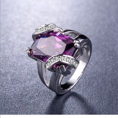 925 Sterling Silver Stamped Radiant Cut Purple Ring Size: 9 It’s Stamped 925 Inside (Shown In The Pictures) Main Stone: Purple Sapphire Secondary Stone: White Sapphire Metal: 925 Sterling Silver Style: Radiant Cut Brand New Never Used Silver Amethyst Promise Ring With Diamond Accents, Silver Amethyst Ring With Diamond Accents For Promise, Formal Amethyst Open Ring, Elegant Silver Hallmarked Crystal Ring, Elegant Silver Crystal Ring Hallmarked, Polished Amethyst Anniversary Ring, Polished Amethyst Ring For Anniversary, Silver Open Ring With Accent Stones, Silver Amethyst Ring With Accent Stones For Formal Occasions