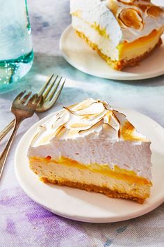 there is a piece of cake on the plate and another slice has been placed next to it