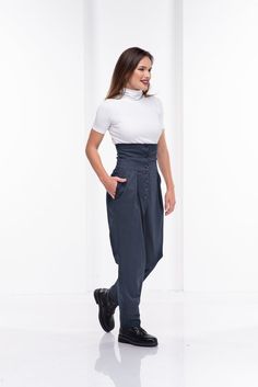 Absolutely gorgeous high waisted pants with front buttons for closure. With two side pockets for your comfort, these pants are a "must have" for your edgy trendy outfit. The model in the picture is 168cm. ⅼ 5.5 ft. tall and is wearing size S / color:  Dark blue🌟 INFO:• Worldwide EXPRESS shipping – please provide a phone number for shipping documents• US Sizing XS to 4XL – body size chart available below• We offer customization to Personal Measurements & Larger Sizes 5XL, 6XL, 7XL ….🌟 MATER Fitted High Waist Cargo Pants With Button Closure, Baggy High-waisted Bottoms With Belt Loops, Blue Full-length Bottoms With Button Closure, Blue Full Length Bottoms With Button Closure, Blue Baggy Bottoms With Button Closure, Baggy High-waist Buttoned Pants, Baggy High-waist Pants With Buttons, Baggy High Waist Pants With Buttons, Fitted High-waisted Cargo Pants With Button Closure