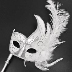 A great companion to the woman's white/silver mask radiating class, designed with fluffy feathers charming patterns with a stick. Mask Ball Party, Silver Masquerade Mask, Couples Masquerade Masks, Gold Masquerade Mask, Mask Ball, Devil Mask, Silver Mask, Feather Mask, Party Mask