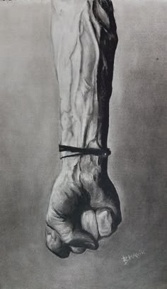 a pencil drawing of a foot with a black and white image on it's side