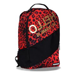 The Spray round Hello Leopard Backpack is covered head to toe in luxurious red leopard print with shimmering gold wording, this bag screams style and is ideal for any trendsetter. Lightweight, weather resistant polyester construction and pockets for a laptop, tablet and sunglasses make this backpack stand out. With 20 inches of interior storage and a stash pocket, this is an ideal essential for students. Reinforced zippers and padded shoulder straps handle the rigors of day to day use while it s Sprayground Backpack, Copper And Grey, Red Leopard Print, Picnic Backpack, Men's Totes, Red Leopard, Commuter Bag, Shoulder Backpack, Waterproof Backpack