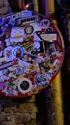 a red table topped with lots of stickers