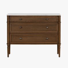 a wooden dresser with two drawers and marble top on the bottom, against a white background