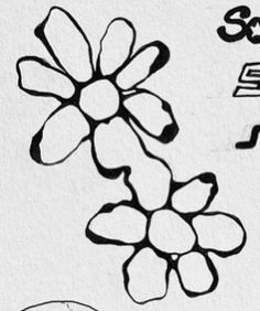 a drawing of flowers and letters on a piece of paper