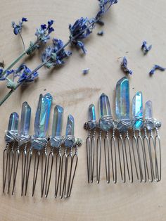 "This blue aura quartz hair comb features five iridescent blue-gray aura quartz crystals measuring between 1/2\" - 1\" tall wire wrapped securely on a 2\" wide silver hair comb.  This boho crystal hairpin is perfect for weddings, photoshoots, dress up, festivals, or any time you want to add a bit of magic to your look. This Crystal Hair clip slides into the hair comfortably Blue aura quartz crystal helps you connect to your higher spirituality, speak your truth, and channel positive cosmic energy of serenity and joy.  Don't see a color, style, or size you like? Message me, and I will customize a piece to fit your exact taste! Please like my page on Facebook: https://www.facebook.com/HempClub I created this shop in memory of my best friend Julie Elizabeth Berls, who passed away December 31s Gray Aura, Blue Aura Quartz, Crystal Hair Clip, Speak Your Truth, Silver Hair Comb, Aura Quartz Crystal, Blue Aura, Crystal Hair Accessories, Crystal Hair Clips