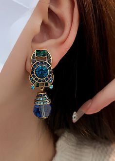 Novelty Blue Overgild Zircon Crystal Drop EarringsMade of fine Overgild Zircon Crystal.Measurement: 4.7cm/1.833" * 1.6cm/0.624". Matches easily with daily hairstyle, dresses & Shirts Blue Jeweled Dangle Crystal Earrings, Blue Gemstone Chandelier Drop Earrings, Blue Teardrop Bohemian Crystal Earrings, Bohemian Blue Crystal Earrings, Luxury Gemstone-accented Chandelier Drop Earrings, Daily Hairstyles, Crystal Drop Earrings, Crystal Drop, Drop Earrings