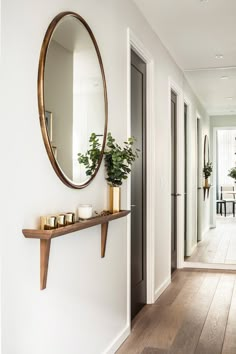 the hallway is clean and ready for us to use as an entrance way in this home