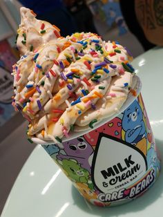 an ice cream sundae with sprinkles on top