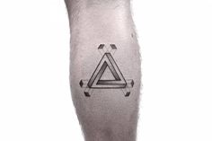 a man's leg with a triangle tattoo on it