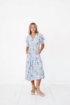 Sky blue floral midi dress with functional front buttons on the bodice, elastic cuff sleeves, elastic waistband and side pockets.

#modesty #modestclothing #modeststyle #modestwear #modestfashionblogger #modestootd 
#womenswear #dressesforwomen #dresses #modestboutique #modest

Self: 100% Rayon, Lining: 100% Polyester

Wash gentle cycle cold.

Aprox. measurements in inches:

S:Length-47 |Bust-32 |Waist-25

M:Length-47 |Bust-34 |Waist-27

L:Length-47 |Bust-36 |Waist-29

conservative dress, modest dresses for women, modest dresses, modest church dresses for women, modest dresses for church, modest church dress, modest Christmas dresses for women