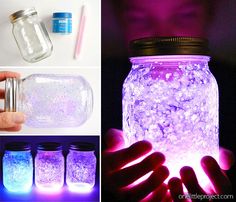 the mason jar is lit up with purple and blue light, while it's surrounded by