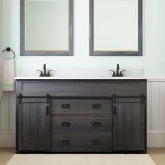 two mirrors are above the double sink vanity