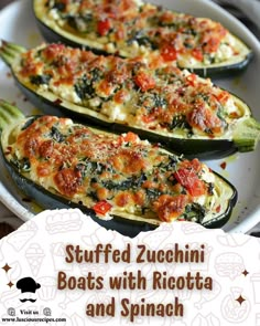 stuffed zucchini boats with ricotta and spinach on a white platter