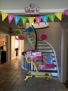 a shopping cart is in front of a welcome to shoppinus sign and stairs