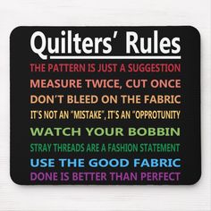 a mouse pad with the words quilters'rules written in different colors on it