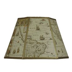 a lamp shade with an old world map on it