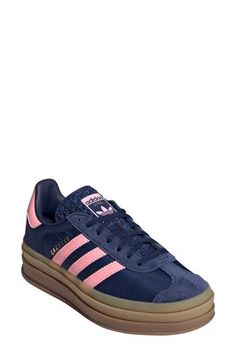 A triple-stacked platform elevates a time-tested sneaker, while serrated side stripes keep it close to its roots. Lace-up style Removable insole Leather upper/synthetic and textile lining/synthetic sole Imported Adidas Gazelle Bold, Gazelle Bold, Bells Christmas, Pink Dark, Platform Sneaker, Adidas Gazelle, Side Stripe, Christmas Wishlist, Up Styles