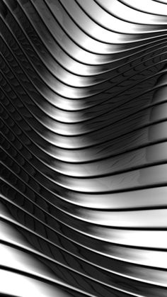 an abstract black and white photo with wavy lines