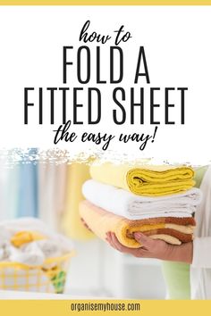 a woman holding towels with the text how to fold a fitted sheet the easy way