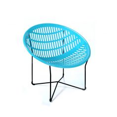 a green plastic chair sitting on top of a metal stand with black legs and an iron frame