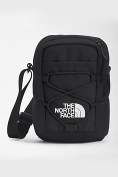 Everyday pack by The North Face in a crossbody design with signature front bungee detail and plenty of internal organization. Made of recycled fabric with a durable, water-repellent (DWR) finish, featuring a large central compartment, internal pocket and secure-zip pocket, small external pocket and adjustable shoulder strap.Content + Care. Spot clean Imported The North Face Jester, North Face Jester, North Face Bag, My Style Bags, Aesthetic Grunge Outfit, Work Gear, Essential Bag, Everyday Bag, Black Cross Body Bag