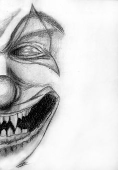 a pencil drawing of a clown's face with teeth and fangs on the nose