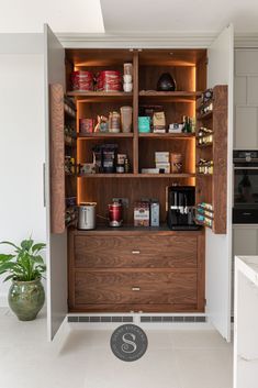 an open pantry with lots of food in it