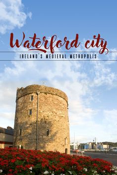 the words waterfront city ireland's medieval metropoliss are in front of a stone tower