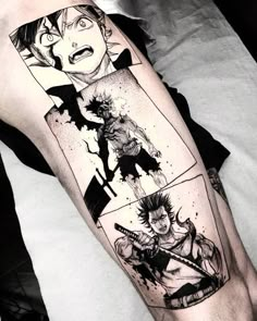 a man's arm with an anime scene on it