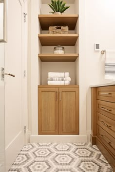 the bathroom is clean and ready to be used as a storage area for toiletries