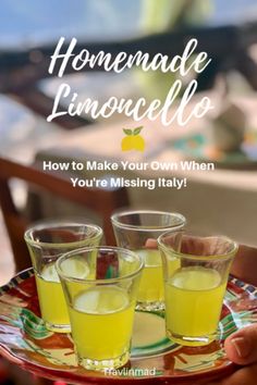 someone holding a plate with three glasses on it and the words homemade limocello