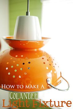 an orange light fixture with the words how to make a colander light fixture