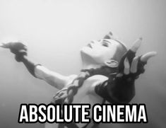 a woman in black and white is holding her arms out with the words absolute movie