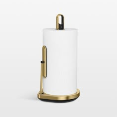 a white toilet paper holder with a gold handle on the top and bottom, in front of a white background