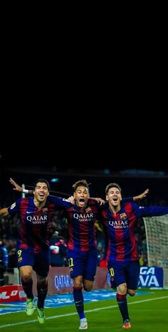 the soccer players are celebrating their goal on the field