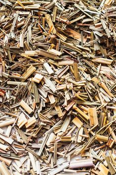 a pile of wood shavings is shown in this image