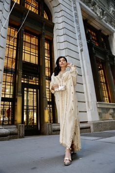 Ivory Rawsilk kaftan fully hand worked front & back with resham, zardozi, seesha & dabka Silk Kaftan With Mirror Work, Festive Cream Kaftan With Resham Embroidery, Eid Anarkali Style Raw Silk Kaftan, Silk Anarkali Long Sleeve Kaftan, Silk Anarkali Kaftan With Long Sleeves, Anarkali Silk Kaftan With Long Sleeves, Festive Anarkali Kaftan In Raw Silk, Bollywood Style Maxi Length Kaftan With Zari Work, Anarkali Style Raw Silk Kaftan For Festive Occasions