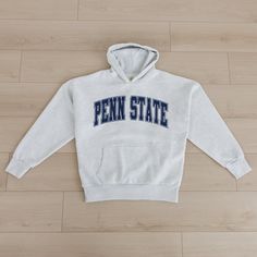 Bring the energy of the game to your wardrobe with our Penn State Nittany Lions oversized premium weight hoodie with ribbed cuff and waistband. Be the ultimate Penn State Nittany Lions fan with this versatile and trendy item. Sporty Athletic Heather Hoodie For Sports, Gray Varsity Hoodie For Sports, Stretch Hoodie For Streetwear And Sports Season, Sporty Athletic Heather Hoodie For Workout, Sporty Hoodie For Sports Events, Sporty Athletic Heather Hoodie With Letter Print, Sporty Hoodie With Letter Print In Athletic Heather, Sports Event Hoodie Activewear, Cotton Hooded Activewear For Sports Events