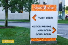 a sign in front of a building that says cross point north lobby visitor parking main lobby south lobby