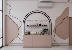 the interior of an ice cream shop with pink and white decor on the walls, shelves and shelving