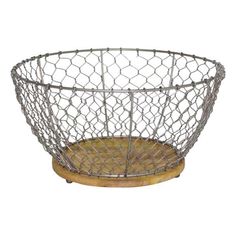 a metal wire basket with wooden base