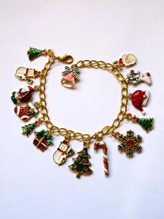 Christmas charm bracelet, 15 enameled and gold-plated charms, snowmen, trees, stockings and more, adjusts 7" to 8", 165 Christmas Charms, Charm Bracelets, Christmas Trees, Aurora, Jewelry Bracelets, Stockings, Charm Bracelet, Charms, Trees